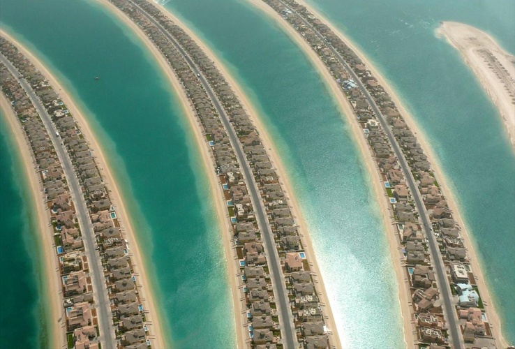 his is an aerial view of the Fronds of the Palm Jumeirah, located in Dubai, United Arab Emirates, on 8 May 2008. This photo was taken from a helicopter ride courtesy of Nakheel.