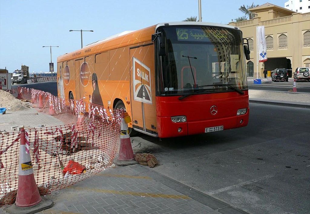 dubai city red bus