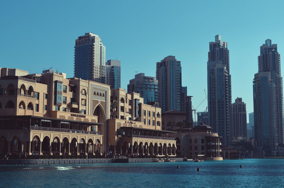 Waterfront buildings in Dubai representing a newcomer's guide to Dubai