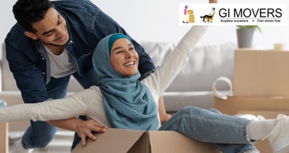 Man and woman packing boxes