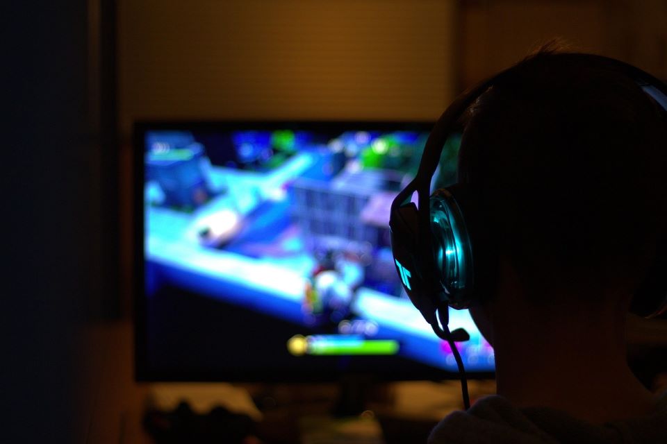 A man playing game on computer