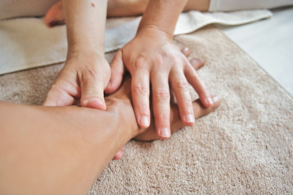 Persons hand doing massage